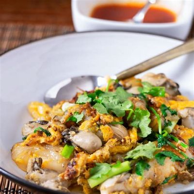  Oyster Omelette: A Delicate Harmony of Briny Seafood and Crispy Golden Batter?