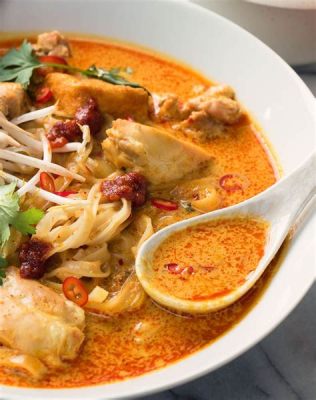 Laksa Johor! A Creamy Coconut Curry Broth Meets Spicy Aromatic Delights on a Plate