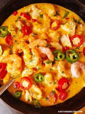  Moqueca! A Symphony of Creamy Coconut and Fiery Peppers